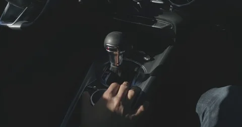 Man driving a sport car while shifting gears black dashboard Stock Footage 100049600