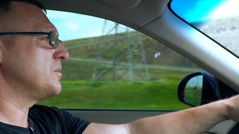 Man driving through mountainous terrain 스톡 동영상 108119473