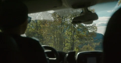 Man Driving Through the Mountains Stock Footage 127197128