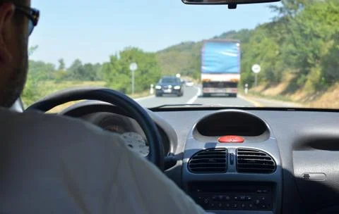 Man driving in a traffic jam Stock Photos
