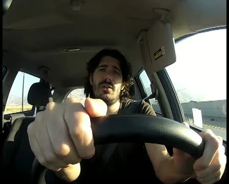 Man driving V2 - PAL Video stock 12458514