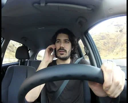 Man driving V5 - PAL Video stock 12457823
