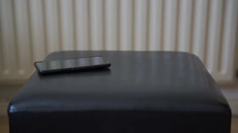 Man dropping a black phone 動画素材 132350771