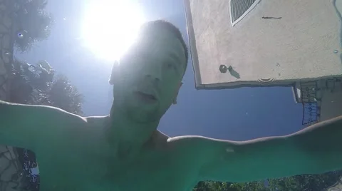 Man drowned in a swimming pool Stock Footage 65063542