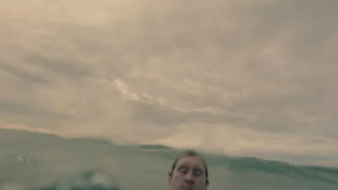Man drowning in the ocean Stock Footage 264021649