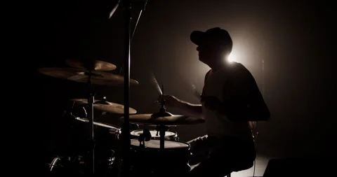 Man with drum kit playing music during rehearsal Stock Footage 249851550
