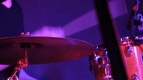 Man drummer playing on a drums on a rock concert in a club. Stock Footage 155193770