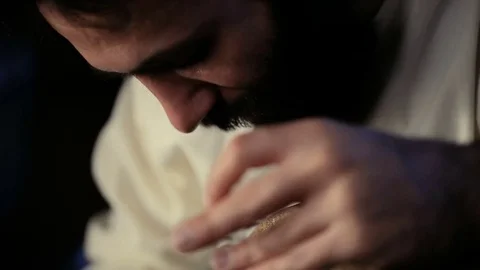 Man drumming out a beat on an arabic percussion drum named Bendir at home. Video stock 74525524