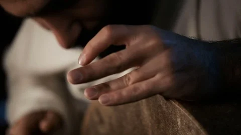 Man drumming out a beat on an arabic percussion drum named Bendir at home. Video stock 74525525