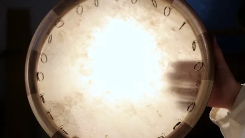 Man drumming out a beat on an arabic percussion drum named Dayereh at home. Video stock 74525859
