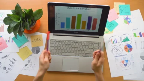 Man drumming by two pens at office surrounded by a lot of paperwork, top view Stock Footage 87781135
