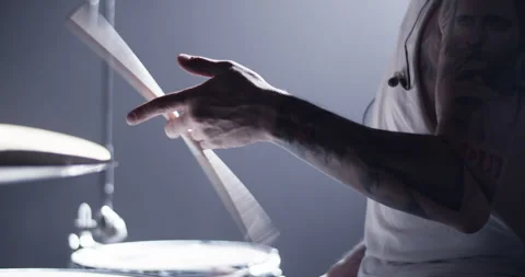Man with drums twirling drumstick Stock Footage 249852582