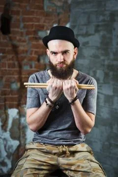 The man with the drumsticks Stock Photos