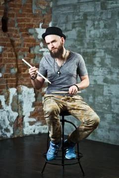The man with the drumsticks Stock Photos