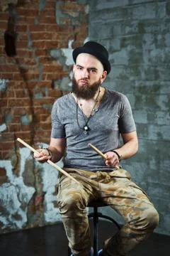 The man with the drumsticks Stock Photos