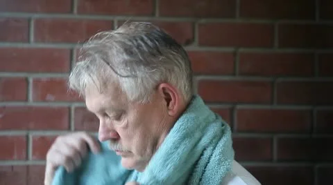 Man drying hair Stock Footage 8979652