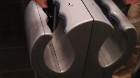 Man Drying Hands In Special Machine Stock Footage 63662336