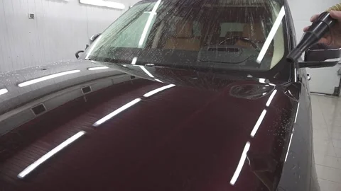 Man drying wet car slow motion 스톡 동영상 155846283