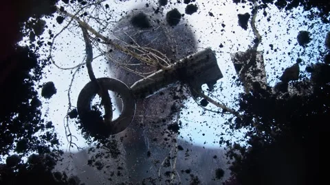 A man with a dubious reputation hides an ancient key in a secluded place Stock Footage 315356413