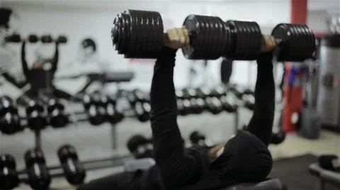 Man dumbbells workout in the gym Stock Footage 56636341