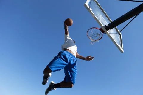 Man Dunking a Basketball Stock Photos