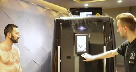 Man during cryotherapy in a special capsule Stock Footage 149409622