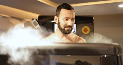 Man during cryotherapy in a special capsule Stock Footage 149409818