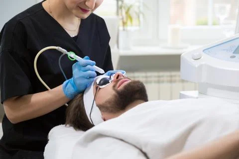 Man during oxygen therapy Stock Photos