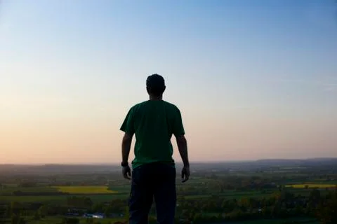 Man at dusk Stock Photos
