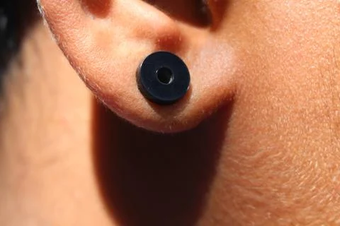 Man earring Stock Photos