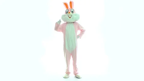 Man in a easter bunny costume dances, have fun on white background. Positive Video stock 107422040