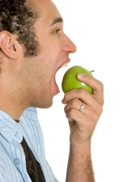 Man eating apple Stock Photos