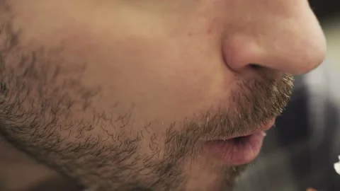 Man eating bread toast spread with jam, sweet sandwich. Slow motion Stock Footage 274389138