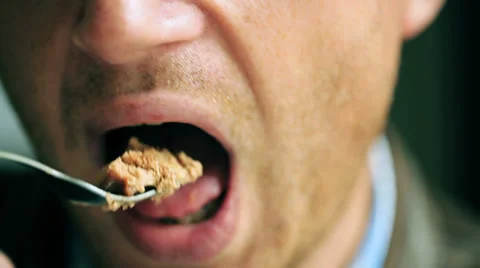 Man eating a cake, closeup, steadycam shot Stock Footage 39714005
