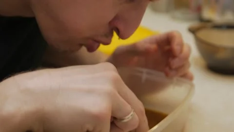 Man Eating Chicken Bones Stock Footage 147956208