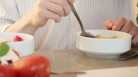 Man eating cornflakes Stock Footage 41277489