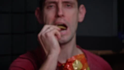 Man Eating Crispy Potato Chips Close-up Stock Footage 260541890