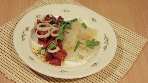 Man eating dish of cabbage with roasted meat Stock Footage 70926367