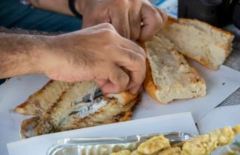 Man eating fish 스톡 사진
