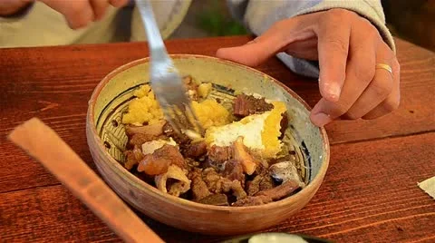 Man eating food, close-up Stock Footage 13153003