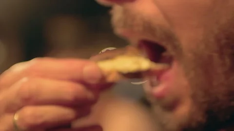 Man Eating Fried Cricket Appetizer Close Up Stock Footage 344537524