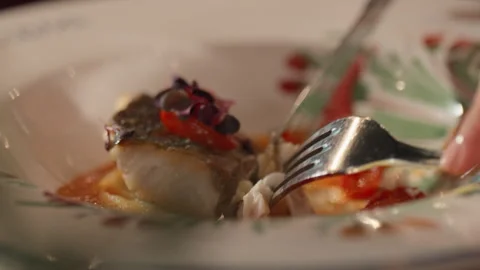 Man Is Eating Frying Fish With Fork And Knife In Restaurant, Dish Closeup. Stock Footage 254482079