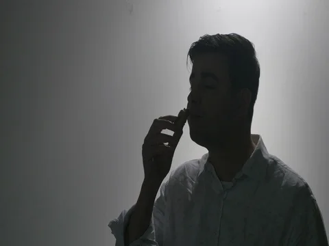 Man Eating Granola Bar Stock Footage