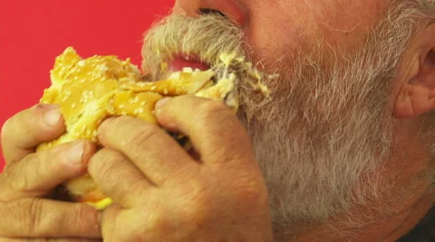 Man eating hamburger Stock-Footage 56455721