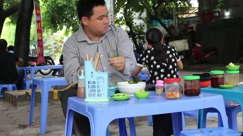 Man eating noodles Stock Footage 58625940