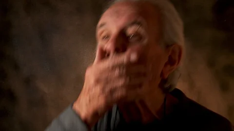 Man eating nuts Stock Footage 108450996