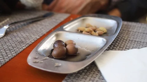 Man eating olives Stock Footage 88798359