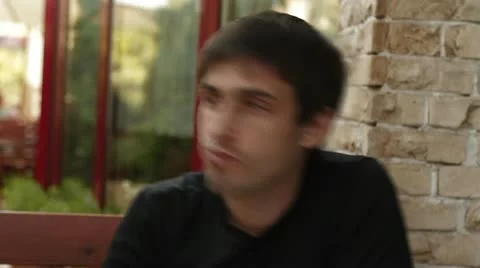 Man eating pizza in cafe Stock Footage 11292793