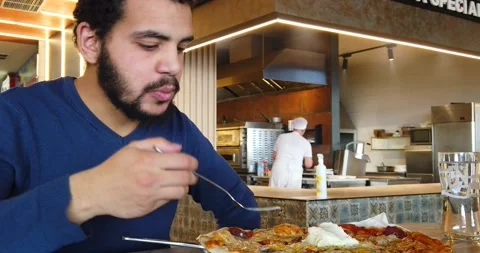 The man eating pizza Stock Footage 170256807