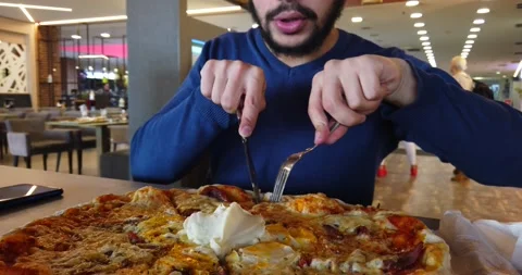 The man eating pizza Stock Footage 170256896